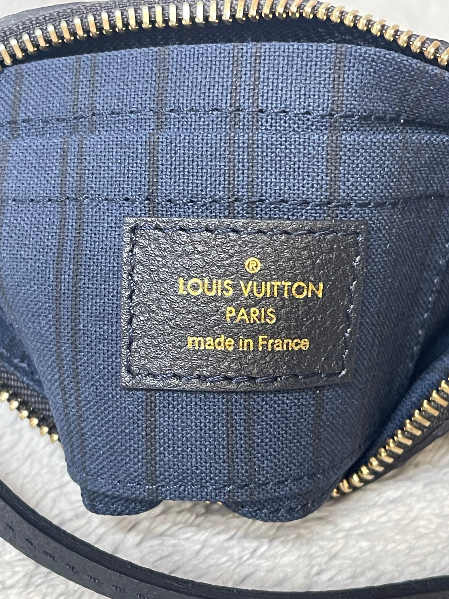 Louis Vuitton Dark Navy Blue / Black Empreinte Leather Mini Pochette.