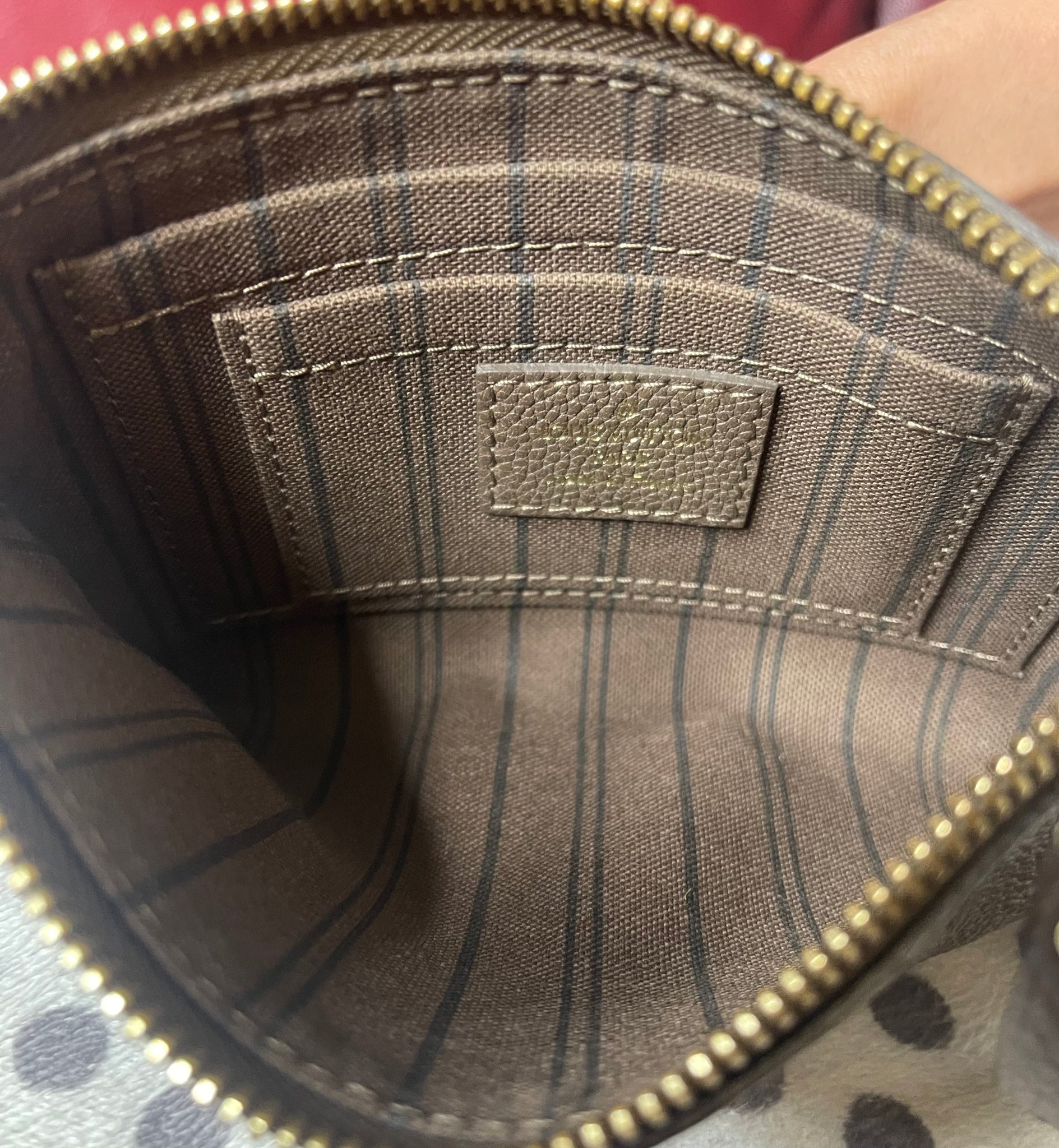 Louis Vuitton Brown Empreinte Leather Mini Pochette VI2181