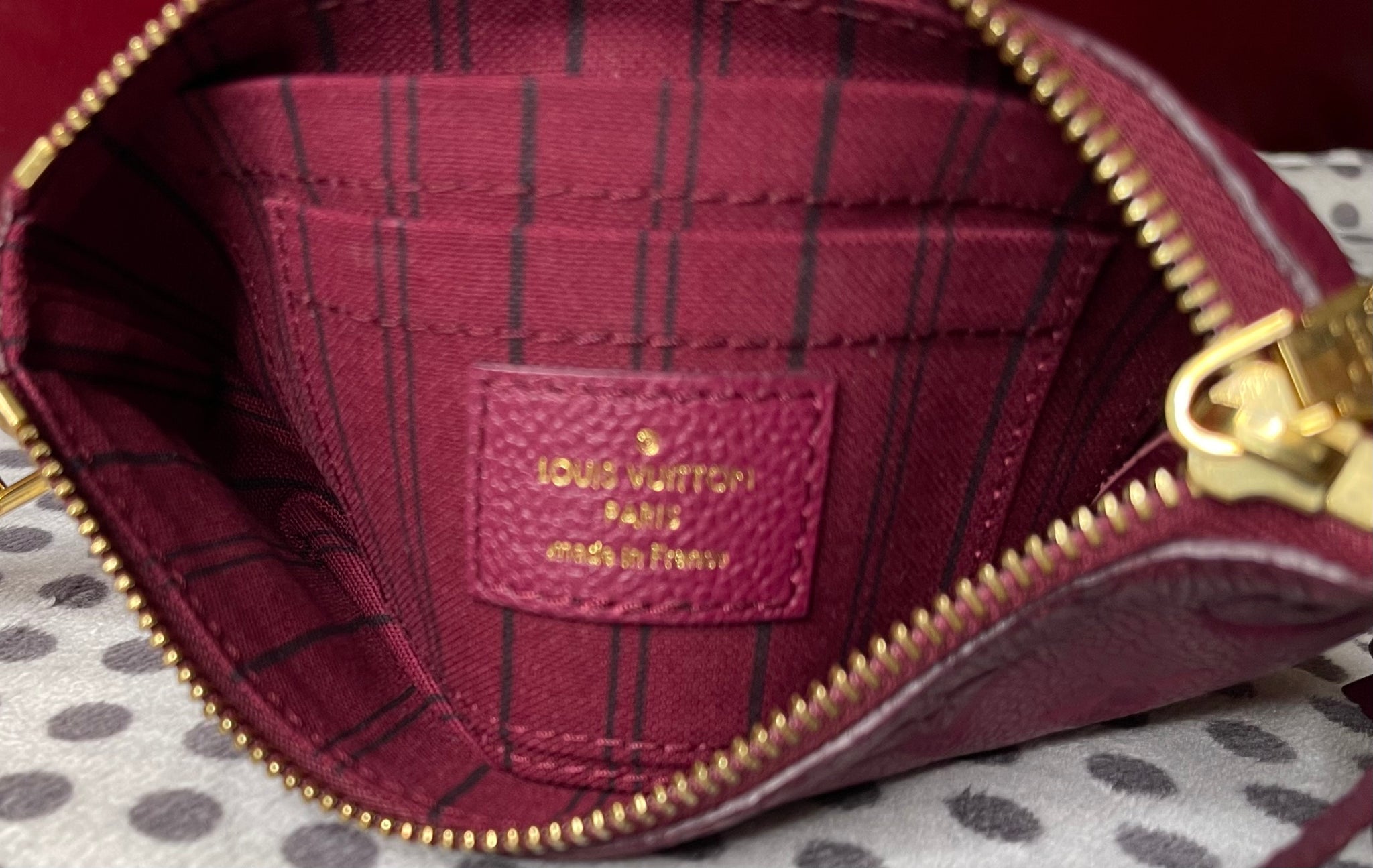 Louis Vuitton Rasin  Empreinte Leather Mini Pochette